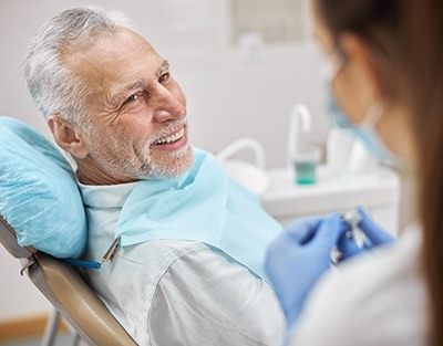 a patient talking to a dental hygienist