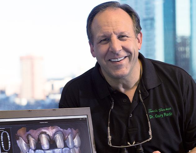 Doctor Gary Radz smiling in Castle Rock dental office