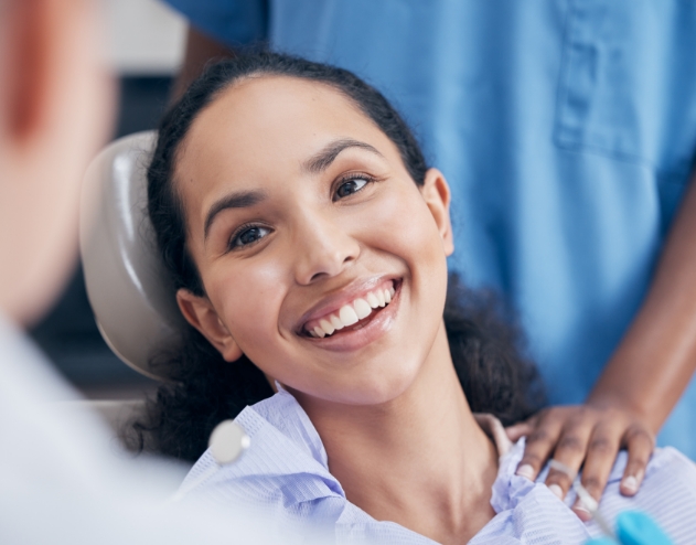 Smiling woman in dental chair