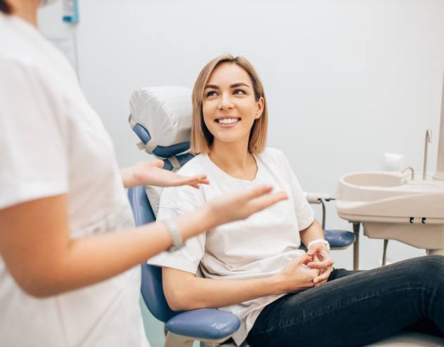 Patient smiles at dentist