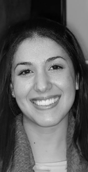 Black and white photo of smiling young woman