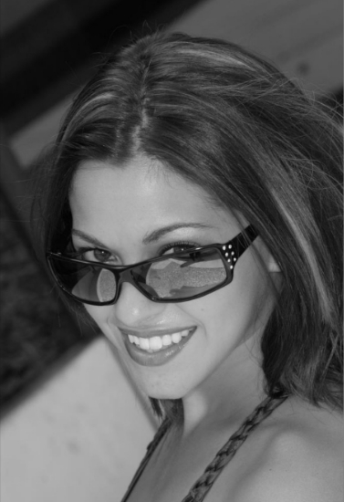 Woman with glasses smiling