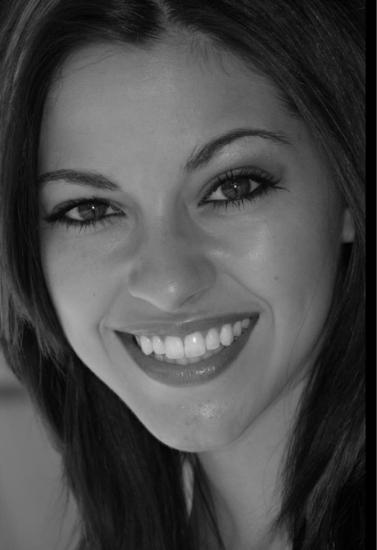 Young woman grinning after dental treatment